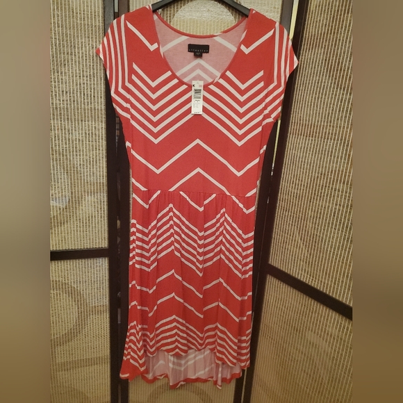 attention Dresses & Skirts - Women's Coral Chevron Dress